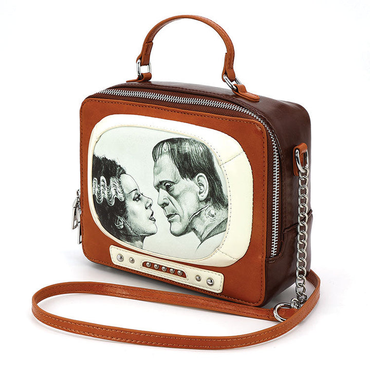 FRANKENSTEIN & BRIDE IN VINTAGE TV X BODY BAG IN VINYL