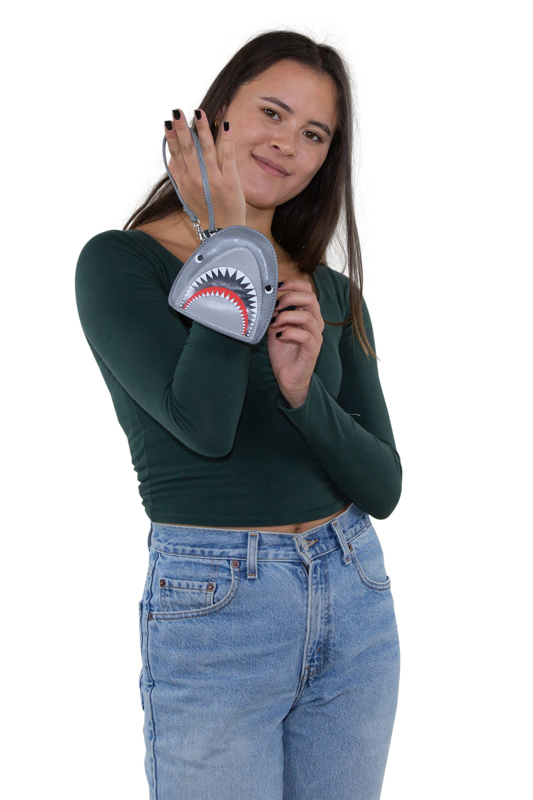 Scary Shark Wristlet with Chained Bloody Hand in Vinyl Material, handheld by model