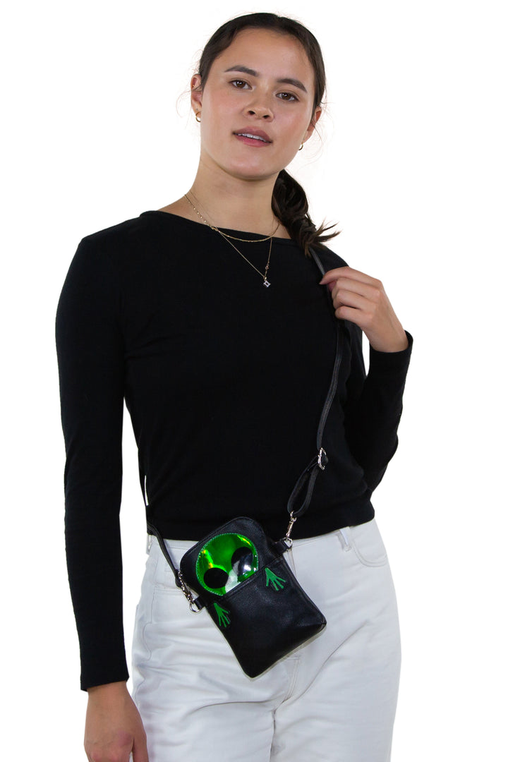 Peeking Alien Crossbody Pouch in Vinyl Material, crossbody style on model