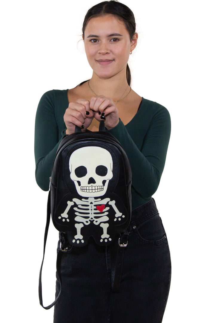 Glow in the Dark Skeleton Mini Backpack in Vinyl Material, front view on model