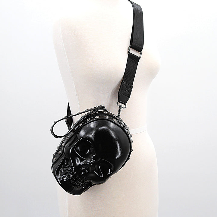 SKULL HEAD XBODY BAG IN VINYL, side view on mannequin