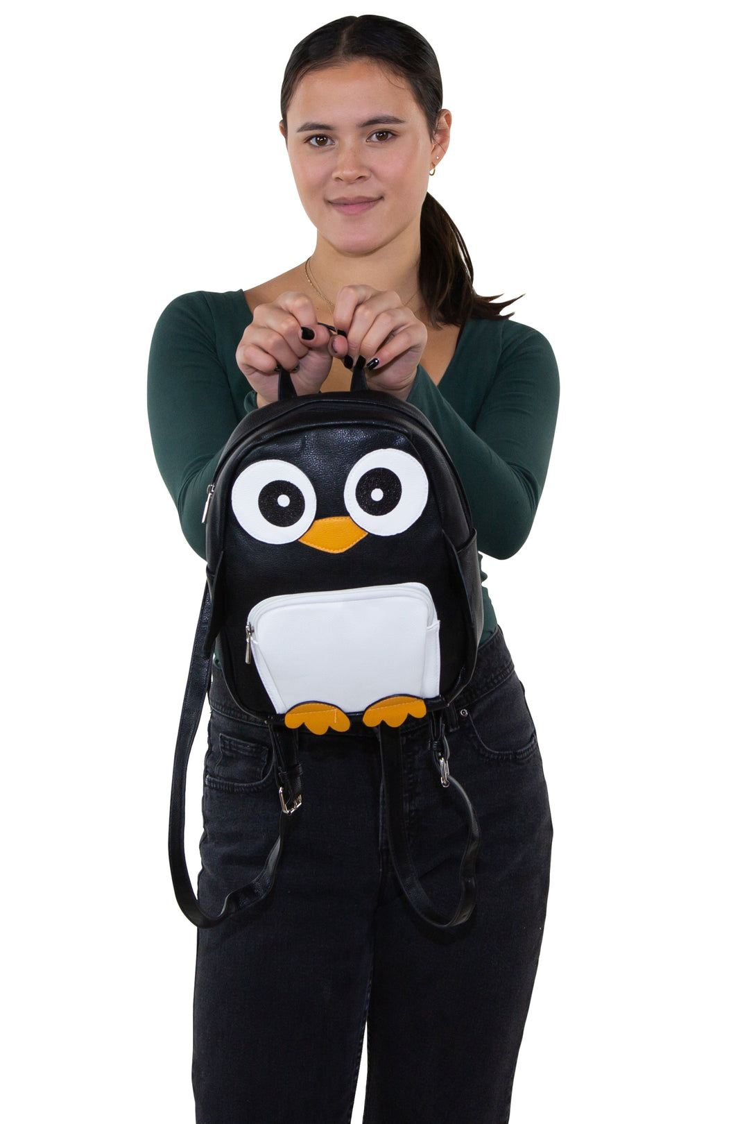 Mini Penguin Backpack in Vinyl Material, front view, handheld by model