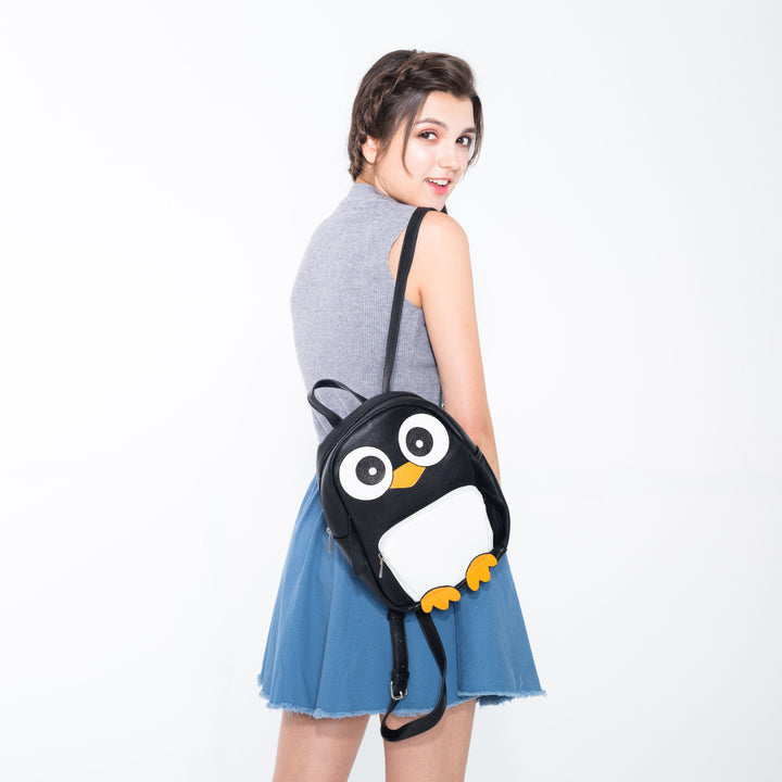 Mini Penguin Backpack in Vinyl Material on model front view