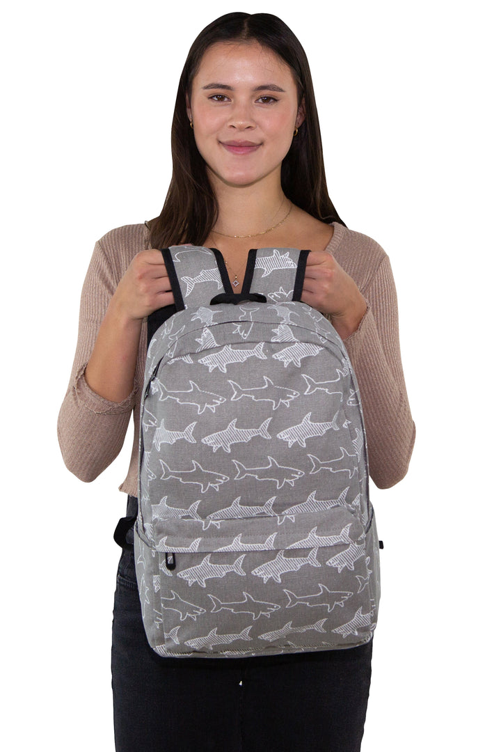 Grey Shark Backpack in Canvas Material, front view, handheld by model