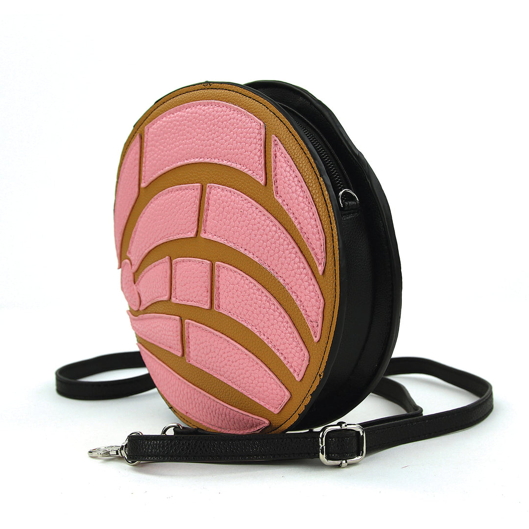 Pink concha cross body bag side view