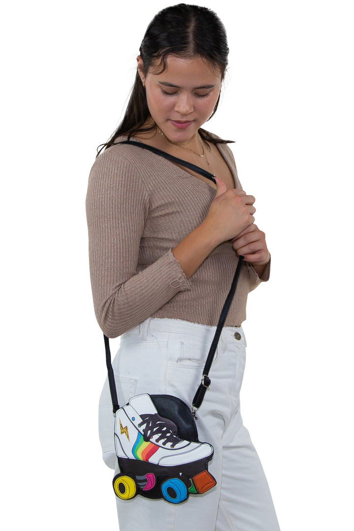 Roller Blade Cross Body Bag in Vinyl Material, shoulder bag style on model