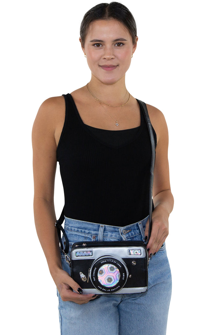 Camera Cross Body Bag in Vinyl, crossbody style on model