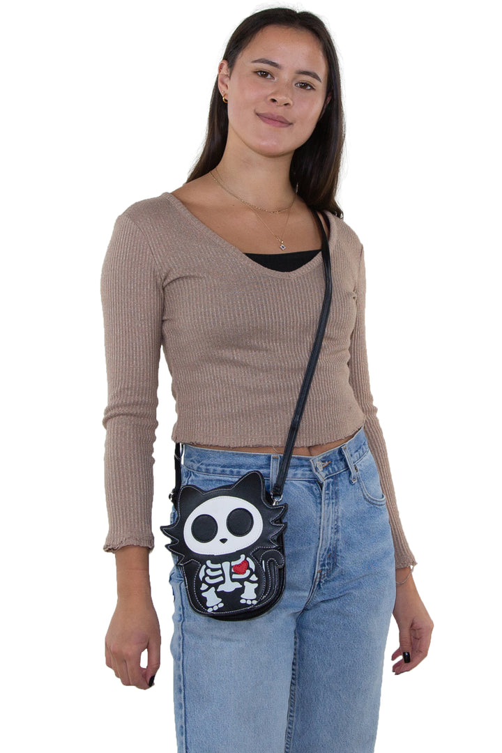 Glow in the Dark Sugar Skull Cat Crossbody Bag in Vinyl, crossbody style on model