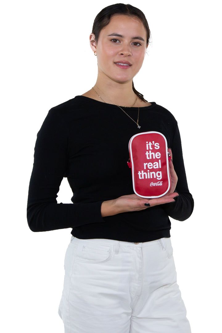 Officially Licensed Coca-Cola Hero Cross Body Bag, back view, handheld by model